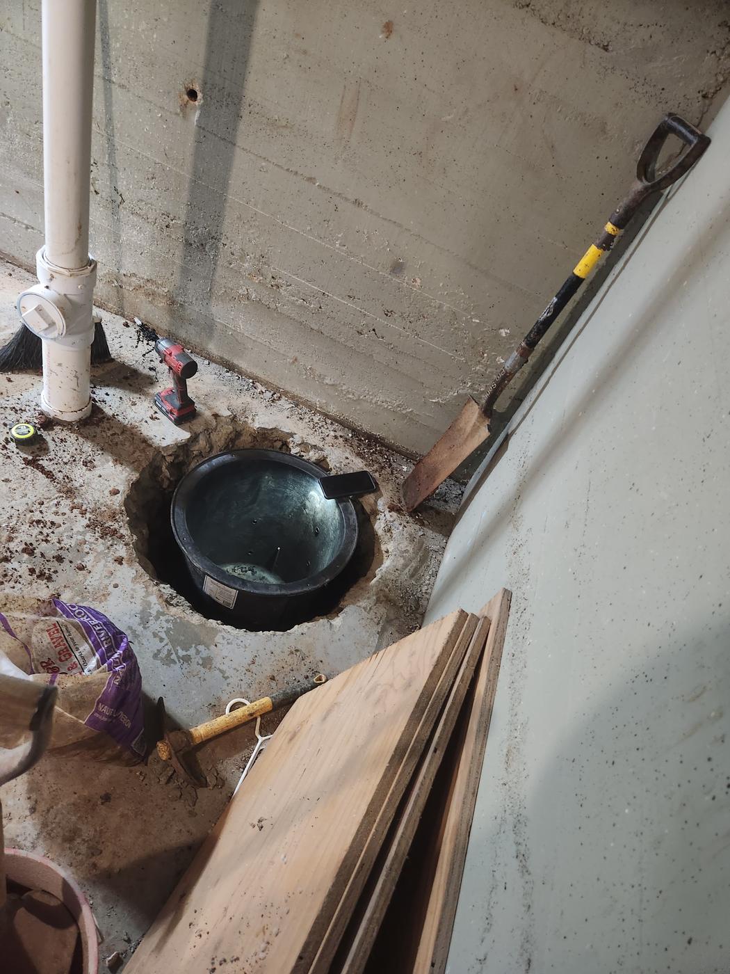 The basin dropped into the pit, floor still to go back.